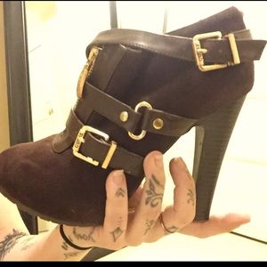 Dark brown Guess booties with gold buckles